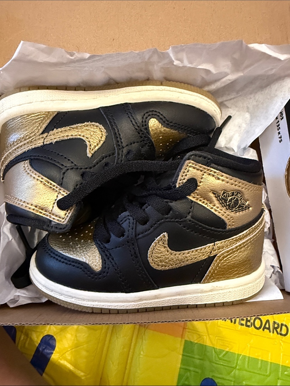 Nike Kids Black and Gold High-Top Sneakers